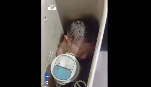 baby girl shown stuffed inside toilet tank in Bangkok, Thailand