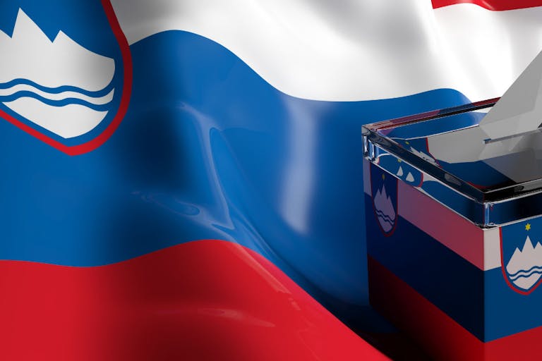 Photo: Rawf8 via Getty Images/iStockphoto Glass ballot box on Slovenia flag background, 3d illustration