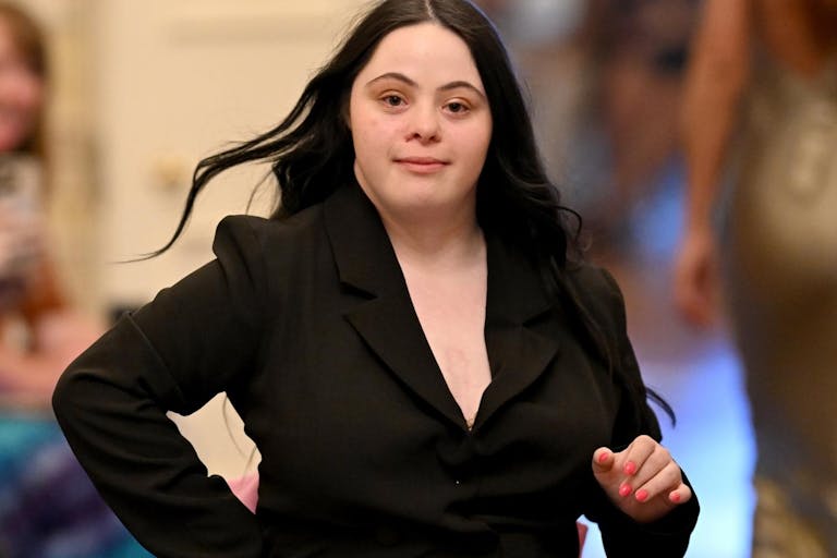 Photo: Kate Green/Getty Images LONDON, ENGLAND - JUNE 13: Ellie Goldstein on the runway during Fashioning Change: Why Inclusion is the Future of Fashion at Carlton House Terrace on June 13, 2025 in London, England.
