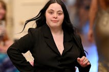 LONDON, ENGLAND - JUNE 13: Ellie Goldstein on the runway during Fashioning Change: Why Inclusion is the Future of Fashion at Carlton House Terrace on June 13, 2025 in London, England.