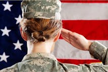 Female American soldier standing & saluting. emale American Soldier Series: Saluting - stock photo