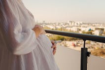 Photo: Vasilii Binzari/Getty Images Romanian gendarmes guard the headquarters of the Sabyc private clinic, which features a poster reading: "With Us It's Possible..." in Bucharest on July 20, 2009. Three persons, comprising two Israeli doctors and a Romanian employee, all specialized in in-vitro fertilization (IVF) were placed under inquiry in relation with an alleged traffic of human eggs, involving the clinic founded in Bucharest in 1999 by Israeli doctors. According to the preliminary results of the inquiry, the clinic was paying egg donors 800 to 1,000 leis (190 to 238 euros) when Romanian law prohibits such payments. Most of the egg recipients and IVFs were Israeli, Italian and British women.