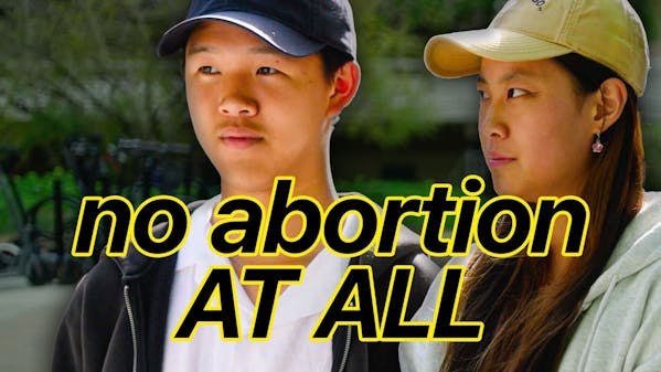 Asian man and woman standing together outside, caption: no abortion at all
