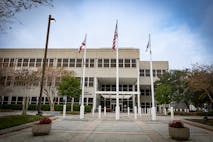Photo: Ivelin Denev/Getty Images Clearwater, Florida USA - December 28 2023: Clearwater government municipality services building with flags in front of it