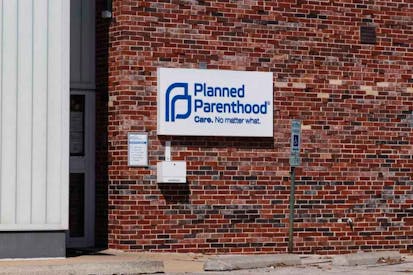 Planned Parenthood sign on brick building. Planned Parenthood location. Planned Parenthood provides reproductive health services in the US VI - stock photo Champaign - Circa August 2019: Planned Parenthood location. Planned Parenthood provides reproductive health services in the US VI