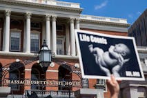Photo: Adam Glanzman/Getty Images BOSTON, MA - JUNE 17: Members of Massachusetts Citizens for Life hold a rally outside the Massachusetts Statehouse on June 17, 2019 in Boston, Massachusetts. Opposing activists were rallying in advance of consideration by lawmakers of measures aimed at loosening restrictions on abortion, including removing criminal penalties for those performed after 24 weeks as well as removing the requirement for parental-consent for pregnant girls under 18.