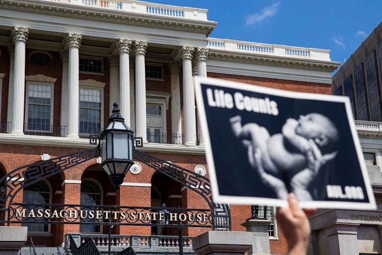 Photo: Adam Glanzman/Getty Images BOSTON, MA - JUNE 17: Members of Massachusetts Citizens for Life hold a rally outside the Massachusetts Statehouse on June 17, 2019 in Boston, Massachusetts. Opposing activists were rallying in advance of consideration by lawmakers of measures aimed at loosening restrictions on abortion, including removing criminal penalties for those performed after 24 weeks as well as removing the requirement for parental-consent for pregnant girls under 18.