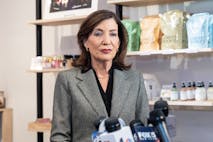 Photo: Lev Radin/Pacific Press/LightRocket via Getty Images NEW YORK, UNITED STATES - 2025/11/19: Governor Kathy Hochul speaks during the press briefing on progress in combating retail theft after state police recovered more than $2.6 million in stolen goods at Brooklyn Made market at City Point.