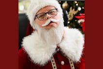 Photo: The Down Syndrome Association of Atlanta Facebook Bradley Carlisle dressed in a red Santa suit.