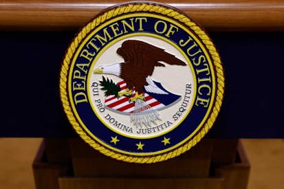 Photo: Anna Moneymaker/Getty Images The photo shows the seal of the Department of Justice.