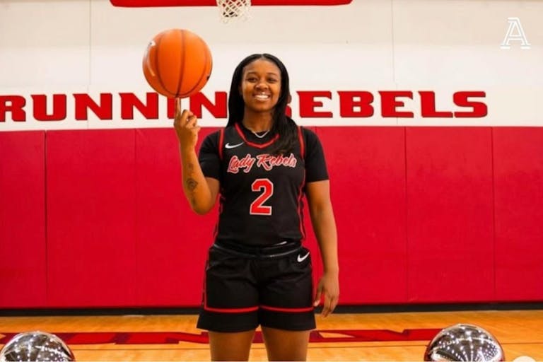 Photo: The Athletic Instagram Image shows Sydni Summers balancing a basketball on her finger in her UNLV uniform.