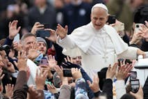 VATICAN, ITALY - 2025/12/25: The Pope toured St. Peter's Square in the Popemobile to greet thousands of faithful gathered in the square in the rain after celebrating his first Christmas Mass at the central altar of St. Peter's Basilica. Pope Leo XIV presided over his first Christmas Mass at the central altar of St. Peter's Basilica in the Vatican, during the solemn celebration that opens Christmas for the Catholic Church, reminding the faithful of the message of peace, hope, and the birth of Jesus. (Photo by Marco Iacobucci/SOPA Images/LightRocket via Getty Images)