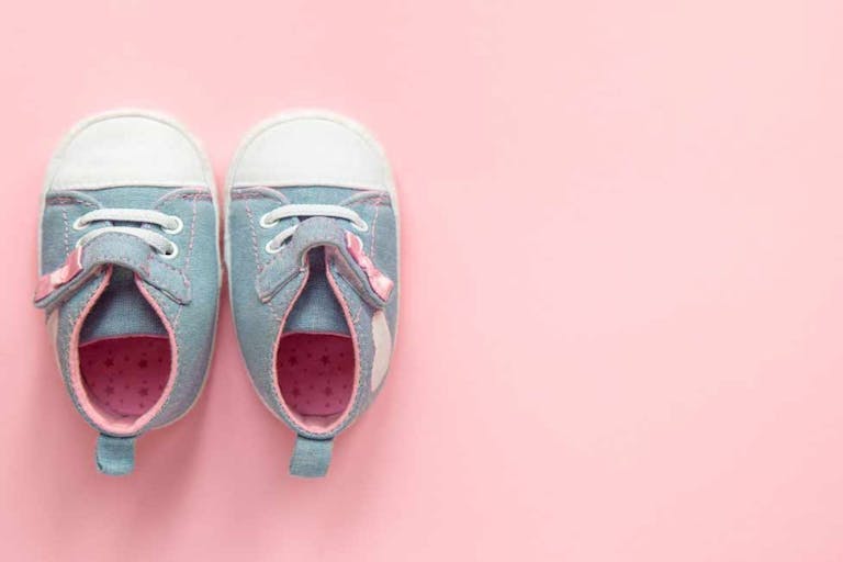 Photo: Wordpress Image of blue and pink baby shoes on a pink background