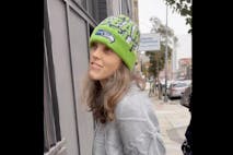 Photo: Survivors of the Abortion Holocaust Image shows Anastasia Rogers in a green hat and gray sweater being arrested outside of Planned Parenthood on December 18, 2025.