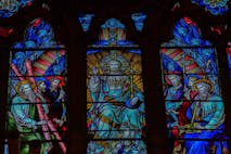 Photo: Howard Pugh (Marais)/Getty Images January 09, 2023. Interior of Inverness Cathedral. Arched ceilings. Stained glass windows - religious depictions. Alter. pews. red seats. Place of prayer. Historical building. The foundation stone was laid by the Archbishop of Canterbury on 1866, and the Cathedral was opened for services in 1869. Inverness, Scottish Highlands, Scotland, United Kingdom