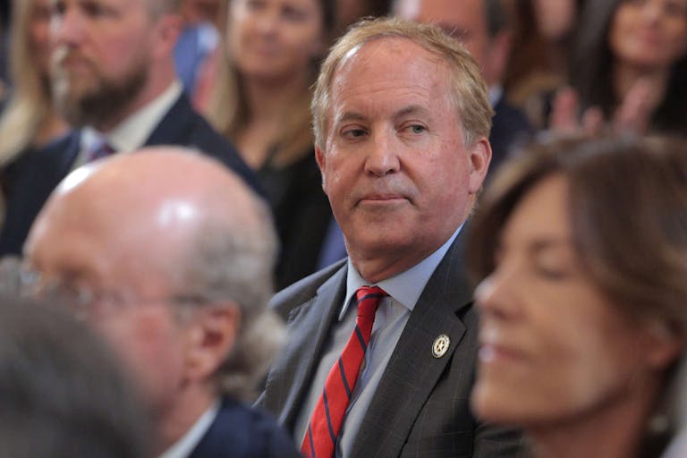 WASHINGTON, DC - MARCH 20: Texas Attorney General Ken Paxton attends the executive order signing ceremony to reduce the size and scope of the Education Department in the East Room of the White House on March 20, 2025 in Washington, DC. The order instructs Education Secretary Linda McMahon, former head of the Small Business Administration and co-founder of the World Wrestling Entertainment, to shrink the $100 billion department, which cannot be dissolved without Congressional approval.