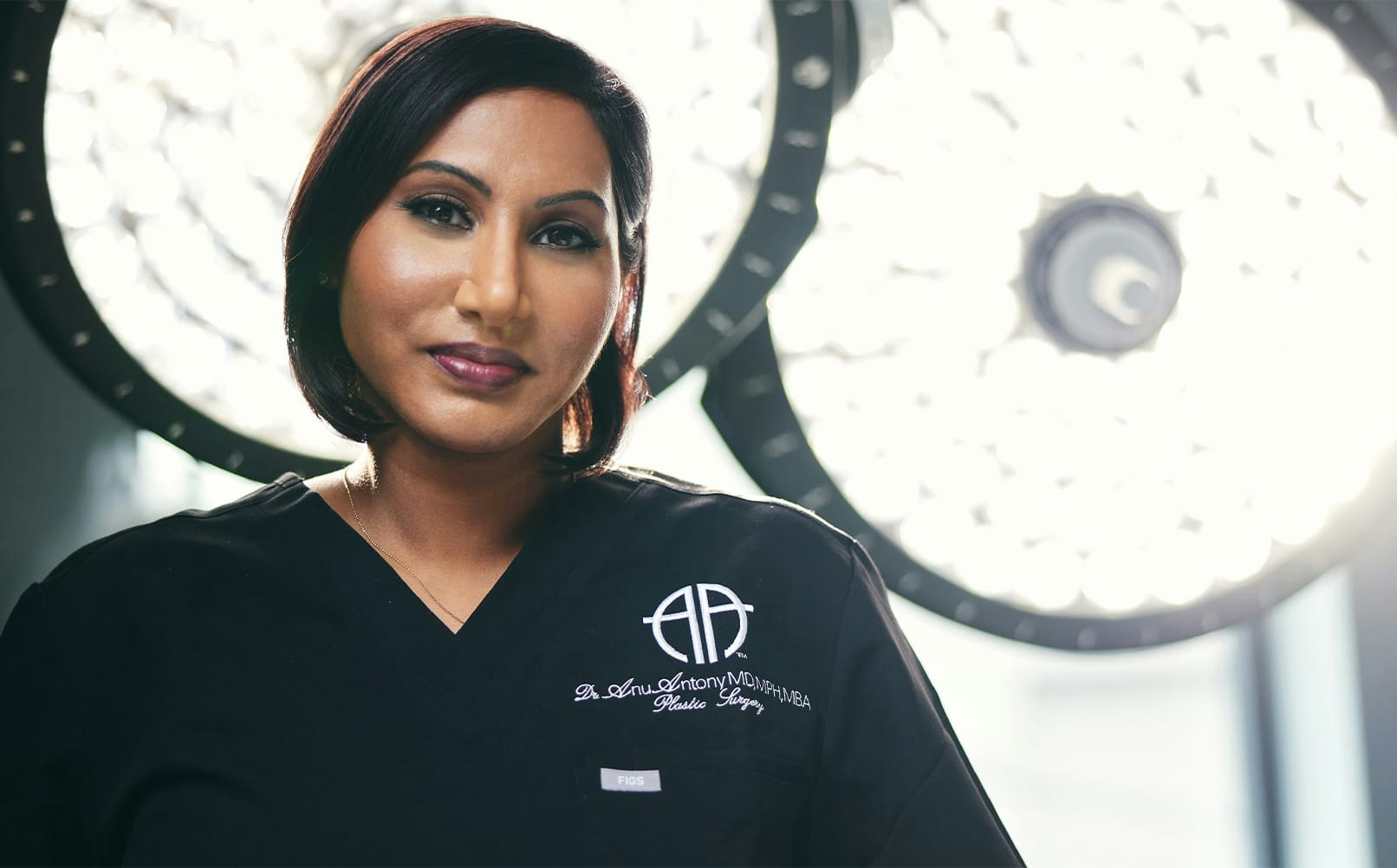doctor in uniform with lights behind her