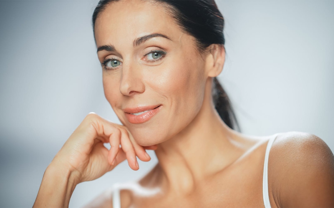patient with pink shirt sitting in chair