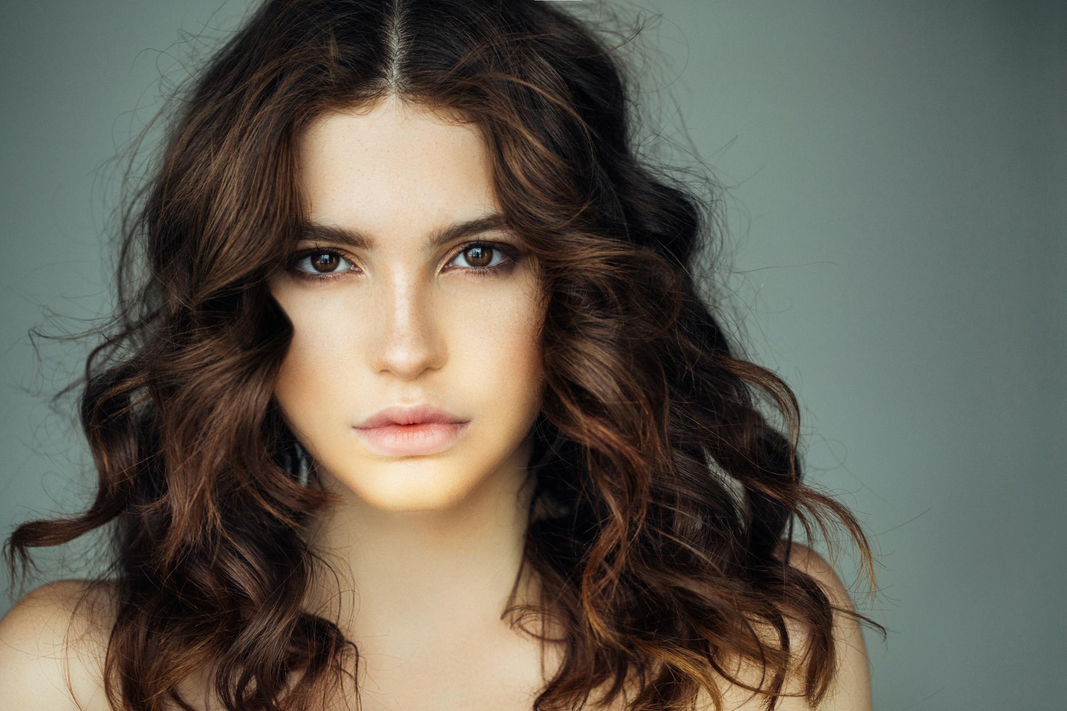 Woman looking at camera with smooth clean skin