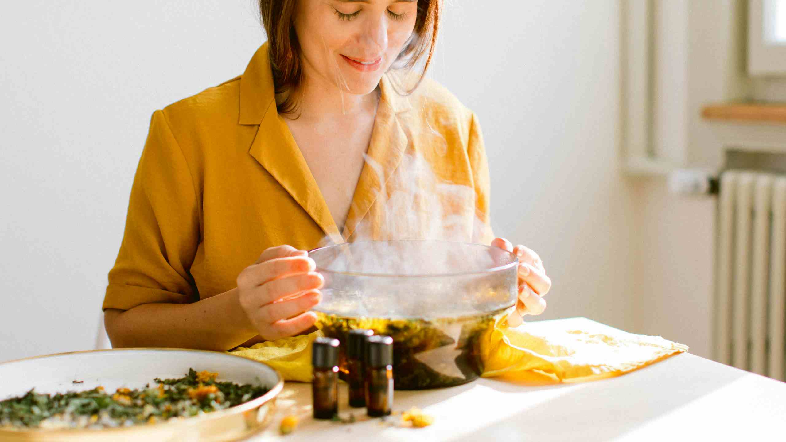 Steaming water bowl with herbs