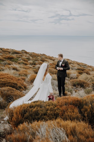 Bride & groom on mountain