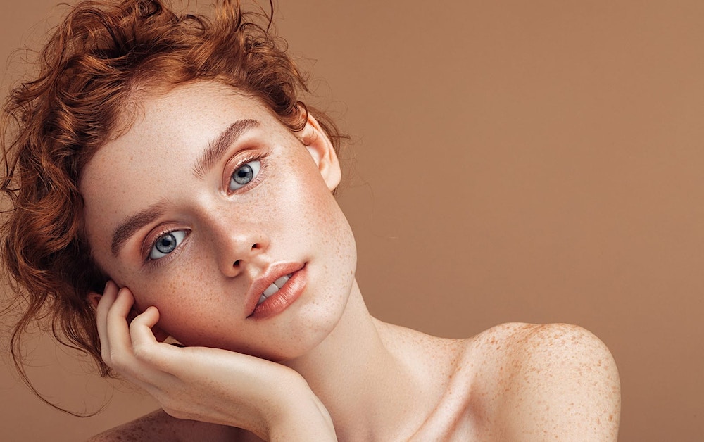 woman leaning on her hand