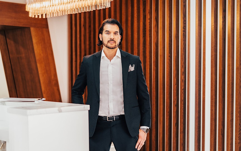 doctor standing at front desk