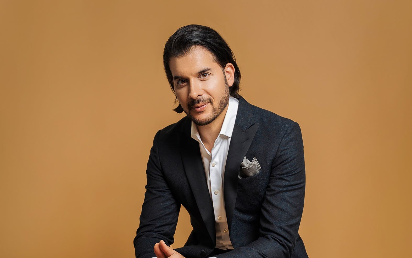 Dr. Shah sitting down