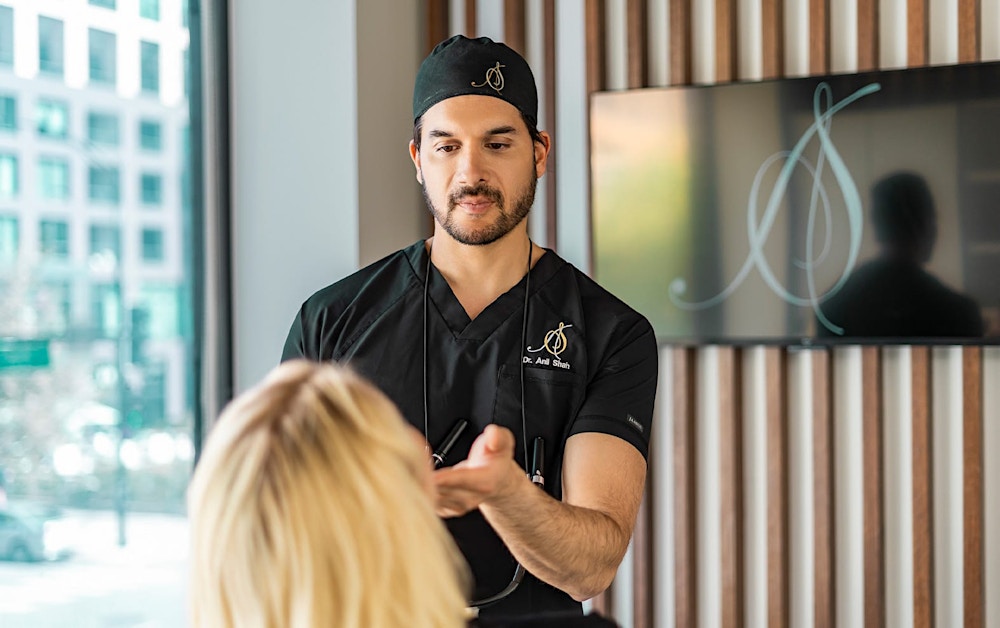 Dr. Shah looking at a patient