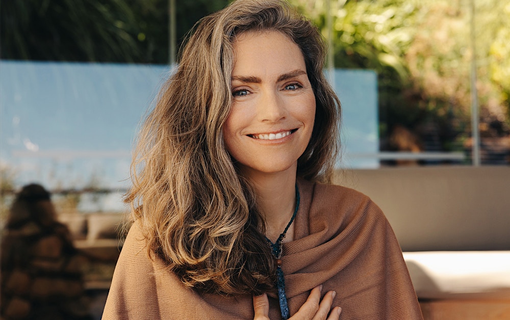Woman looking out a window