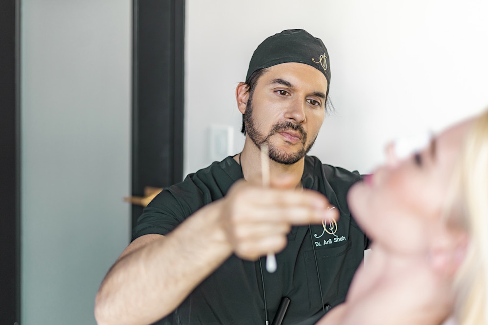 Dr. Shah examining a patient