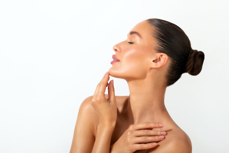 Close up of woman with smooth skin and defined features