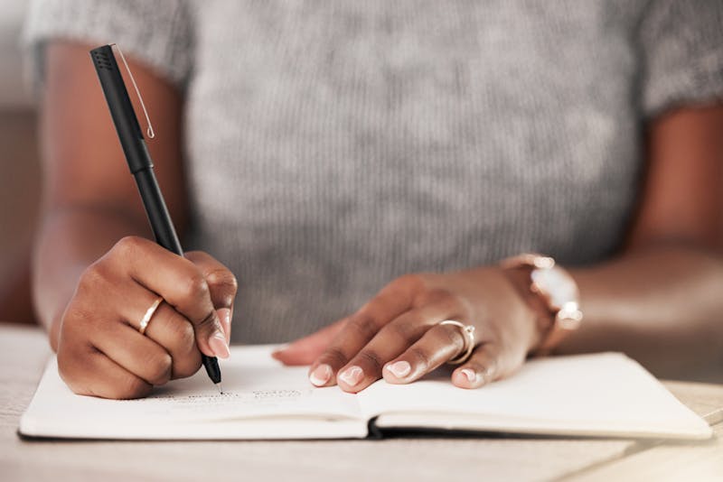 A woman takes notes