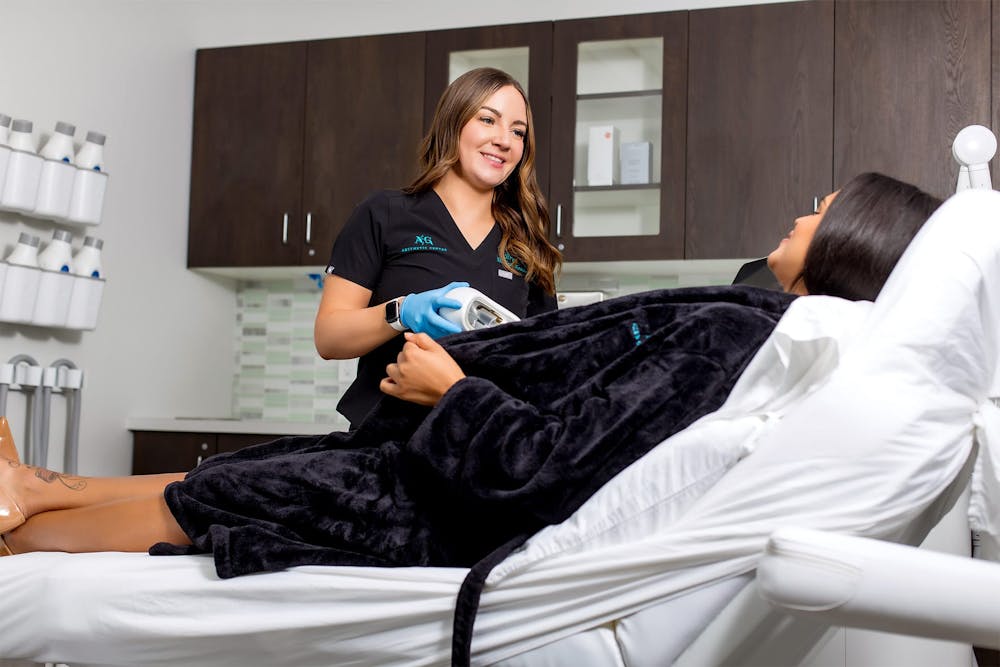 Woman receiving CoolSculpting treatment