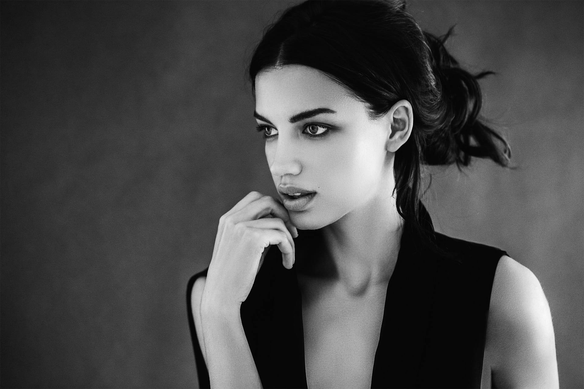 Woman in black top