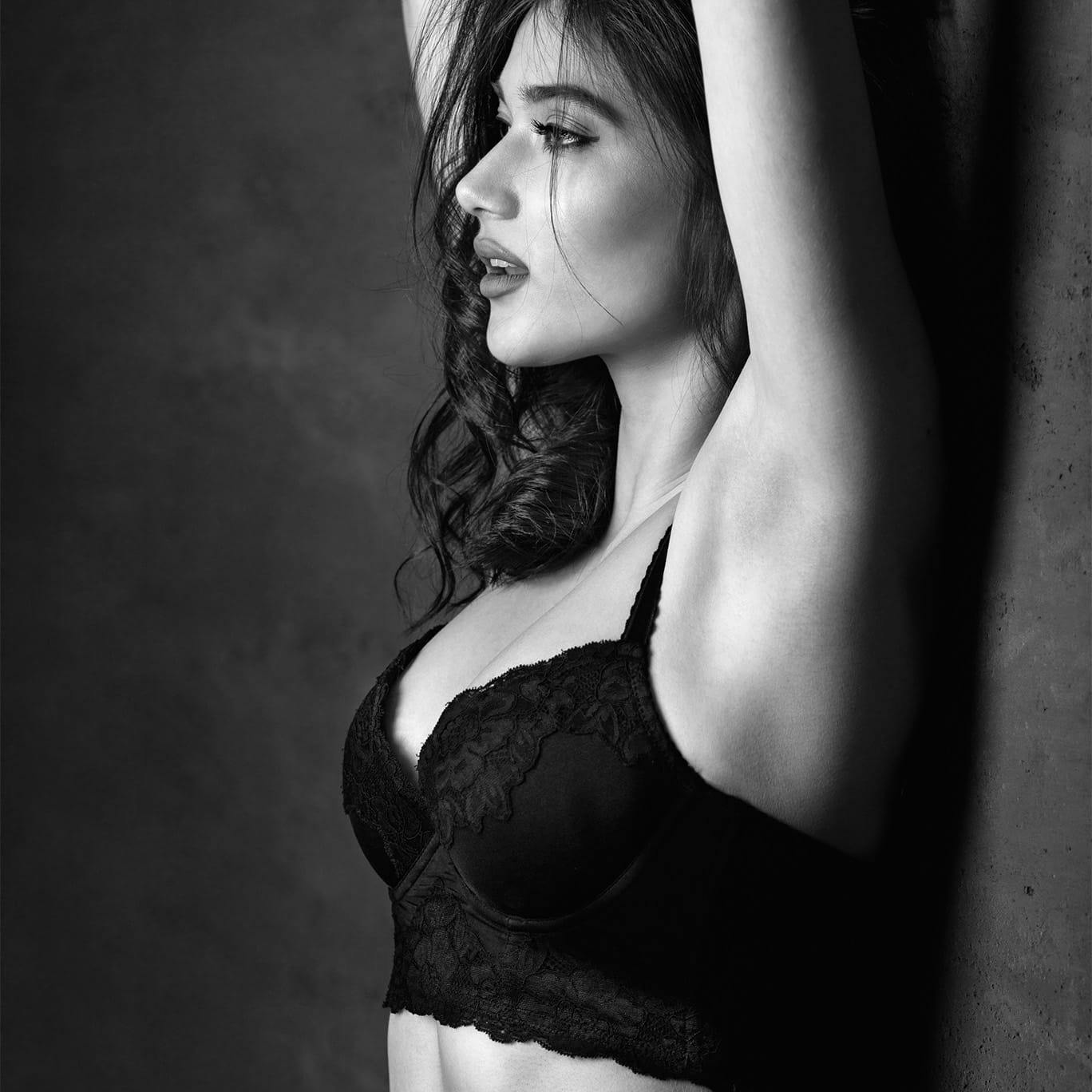 woman in a black bra