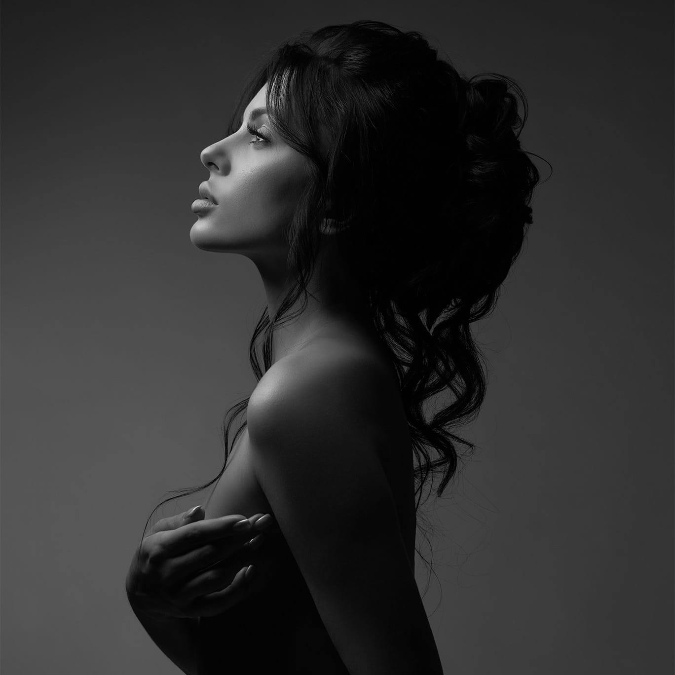 Woman holding breasts