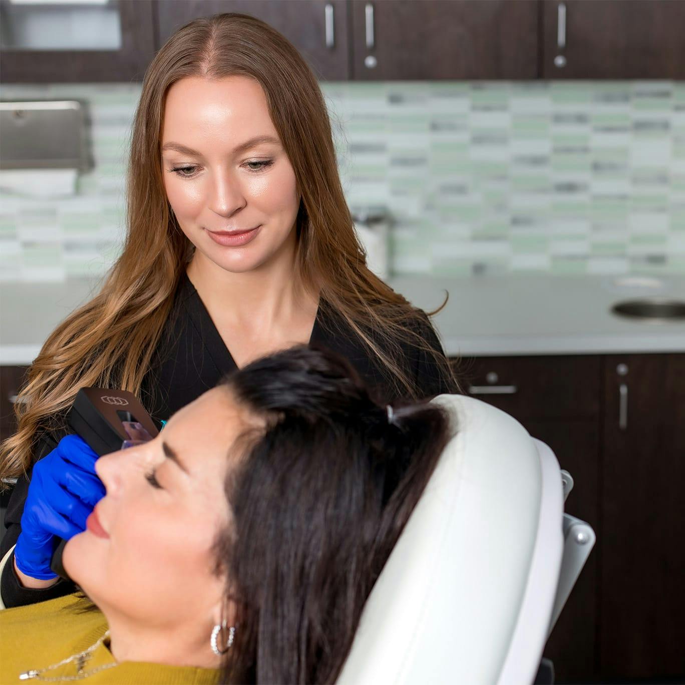 Patient receiving microneedling
