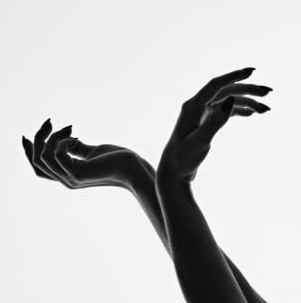 Silhouette of woman's hands