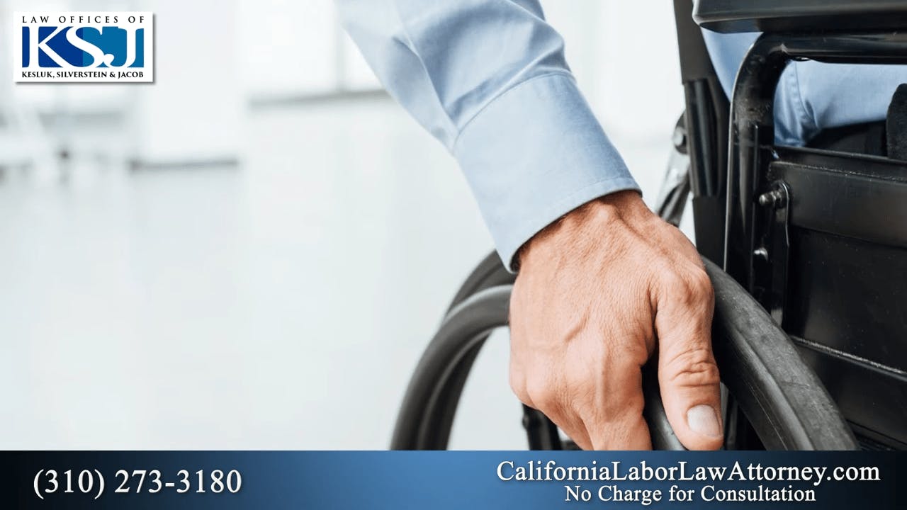man pushing a wheelchair