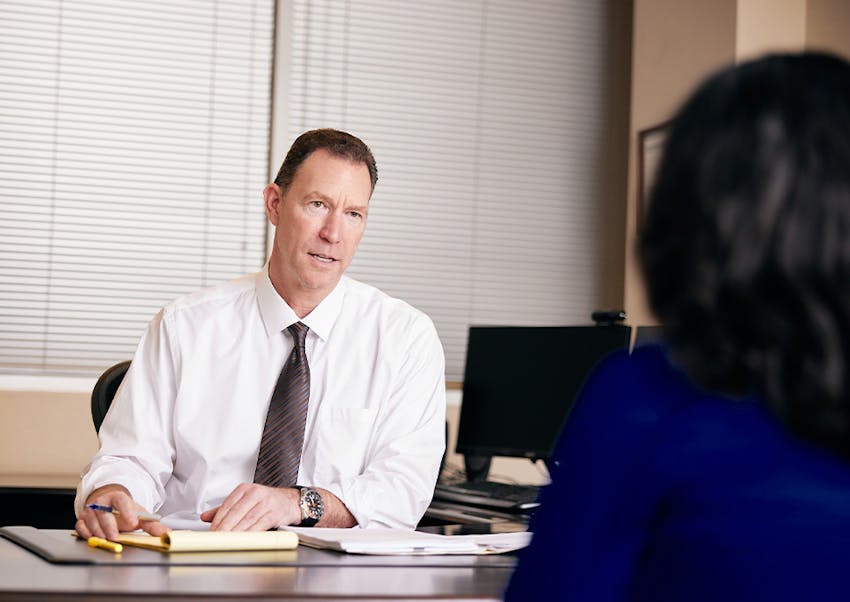 Douglas N. Silverstein speaking with client