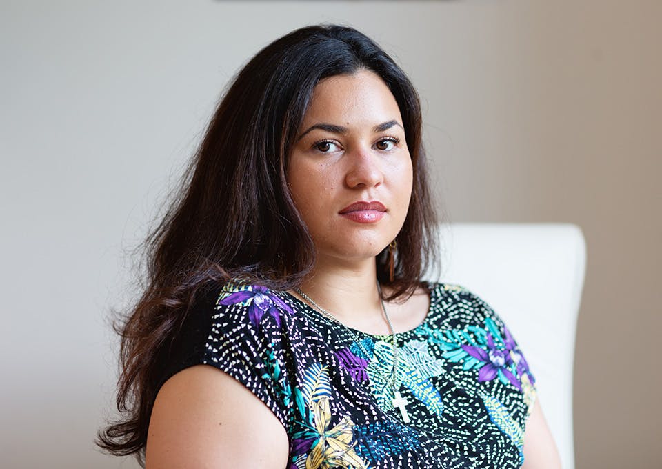 a woman wearing a colorful dress