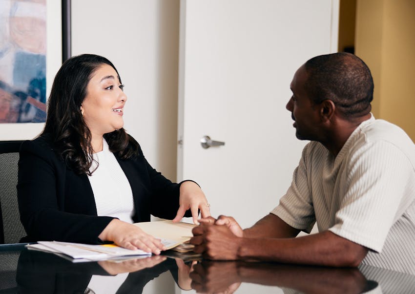 Niki Akhaveissy with a client