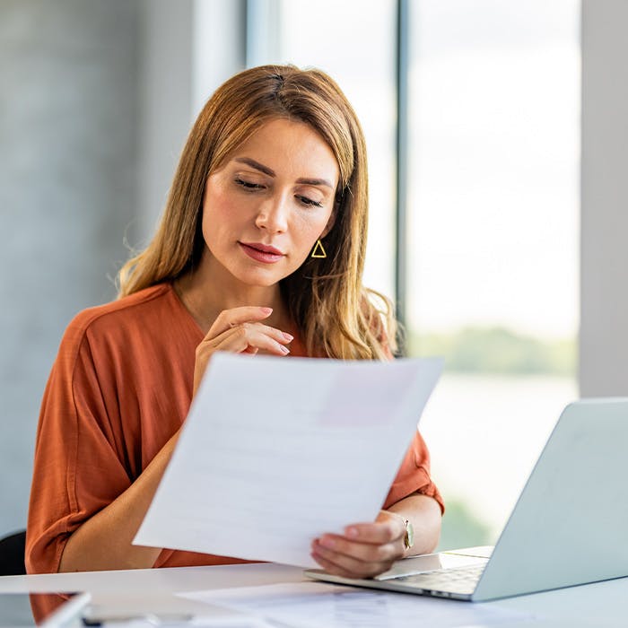 a woman reading a document