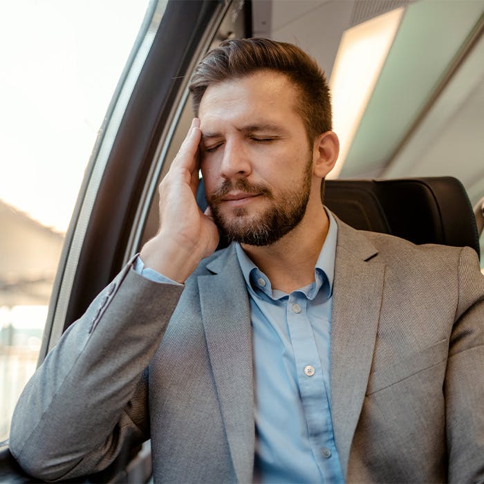 man leaning on his hand