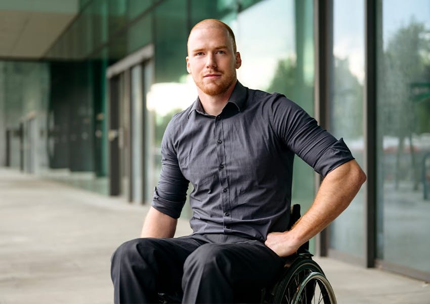 man posing in wheelchair