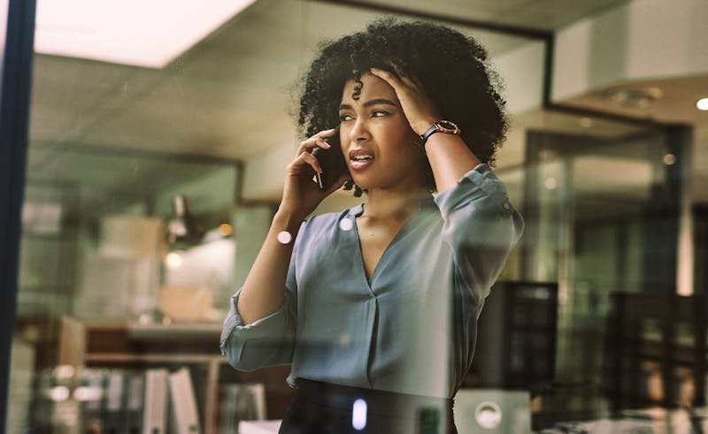 Woman on the phone distressed