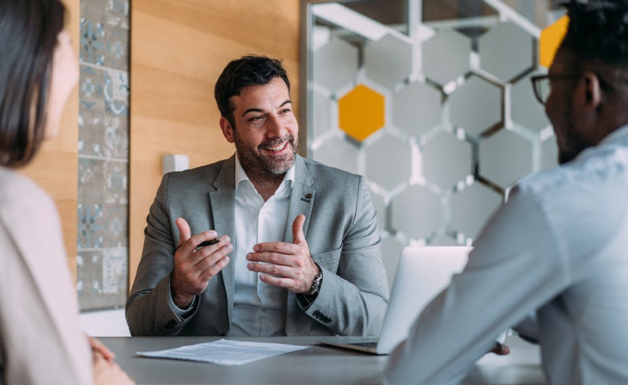 Attorney working with two clients