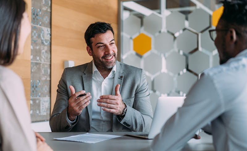 Attorney working with two clients