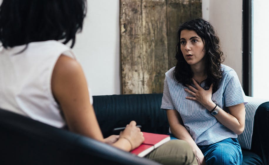 Two women speaking